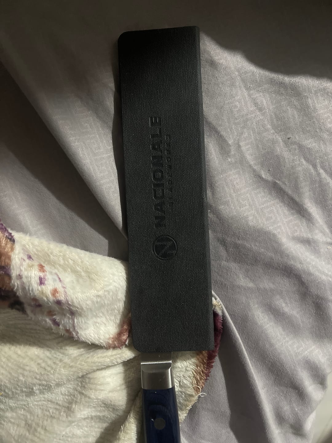Customer photo review of 190mm Magnetic Knife Guard. Blackout PU