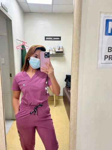 Customer photo review of 5-Pocket MoveTech® Scrub Top - Women / Mauve