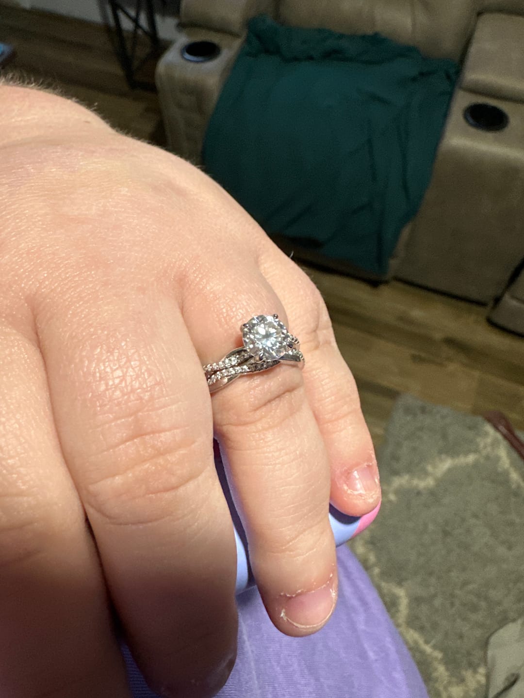Customer photo review of S925 Moissanite 2.0 Carat Round Cut Twist Wedding Ring Set For Everyday Wear
