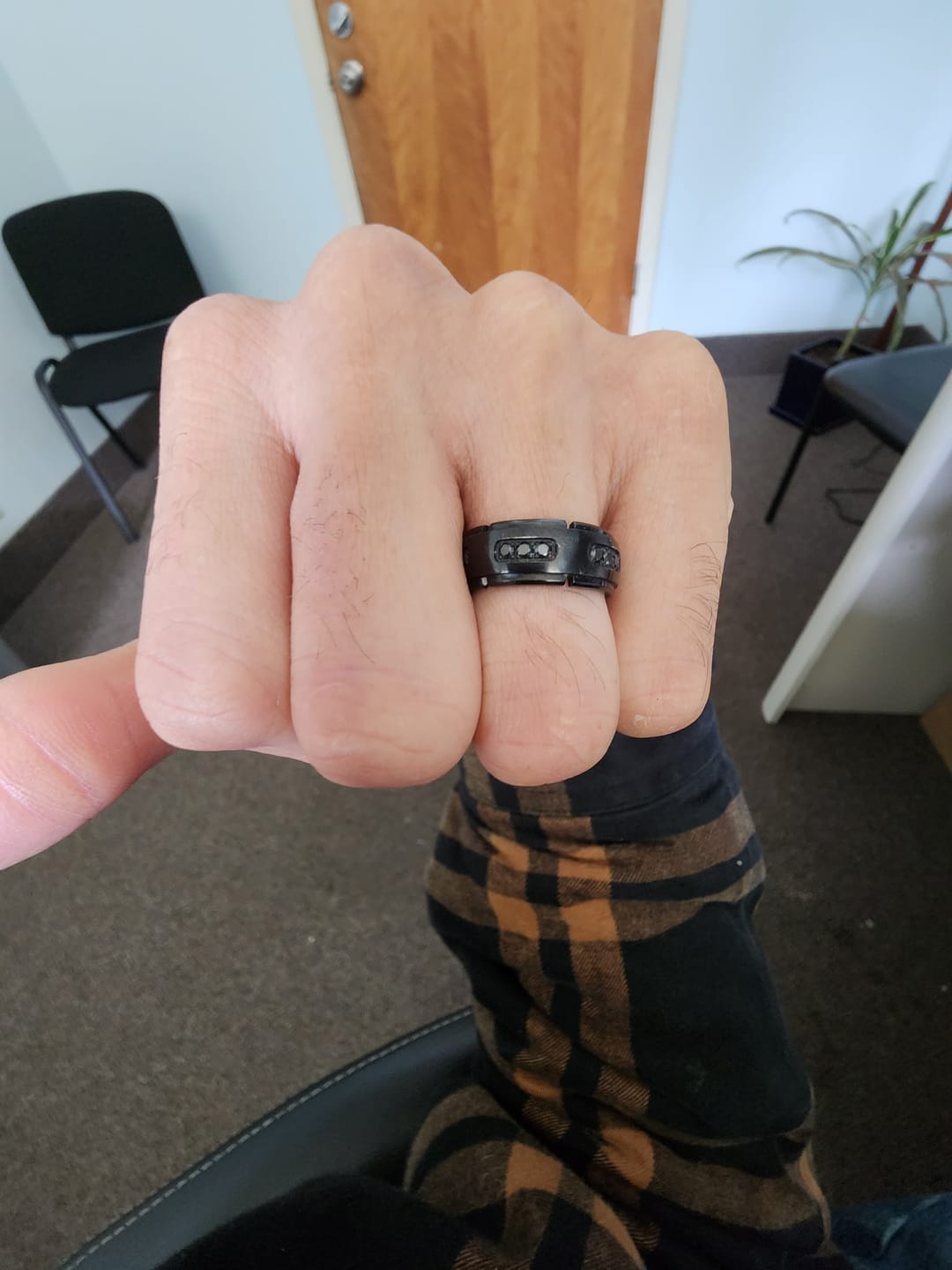 Customer photo review of 8mm Black Titanium Wedding Band with Black Cubic Zircon Diamonds