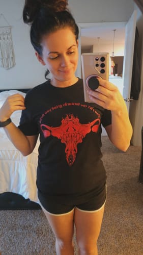 Customer photo review of Don't Let Them Grind You Down, Unisex T-Shirt