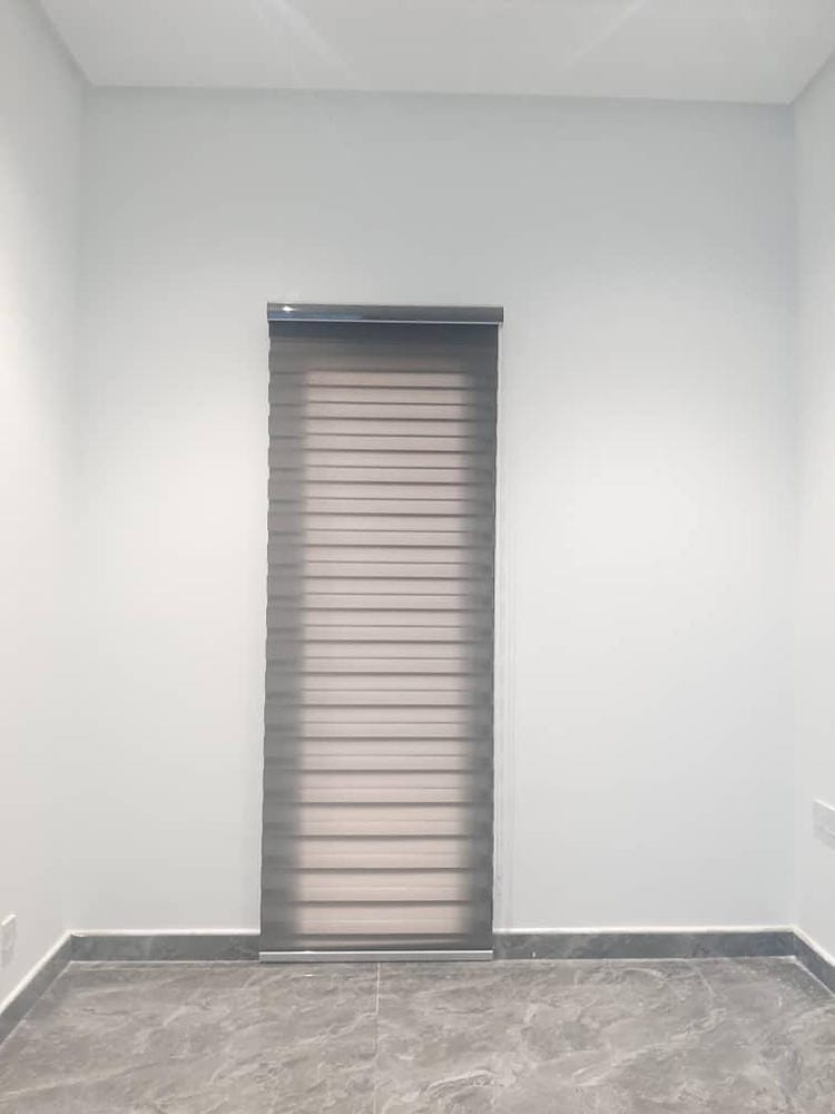 Customer photo review of Tisa Signature Light Filtering Zebra Blinds