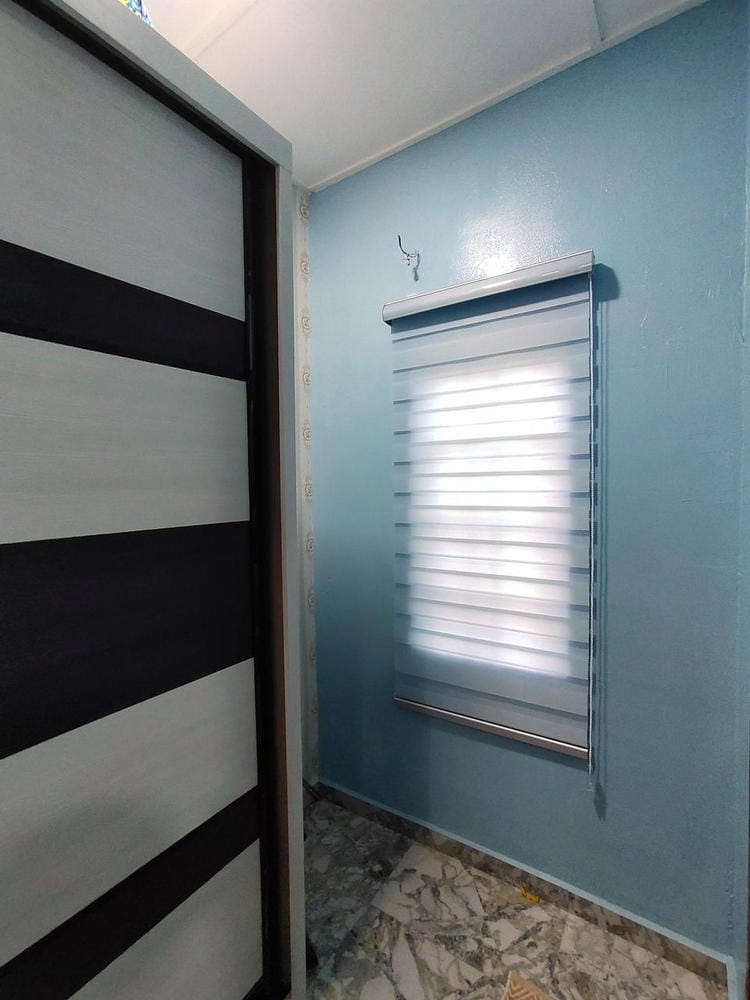 Customer photo review of Tisa Signature Light Filtering Zebra Blinds
