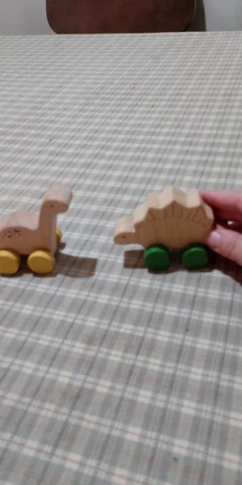 Customer photo review of Beech Wooden Dinosaur On Wheels