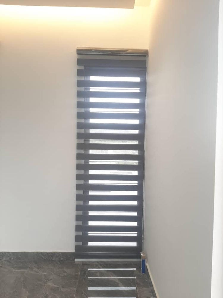 Customer photo review of Tisa Signature Light Filtering Zebra Blinds