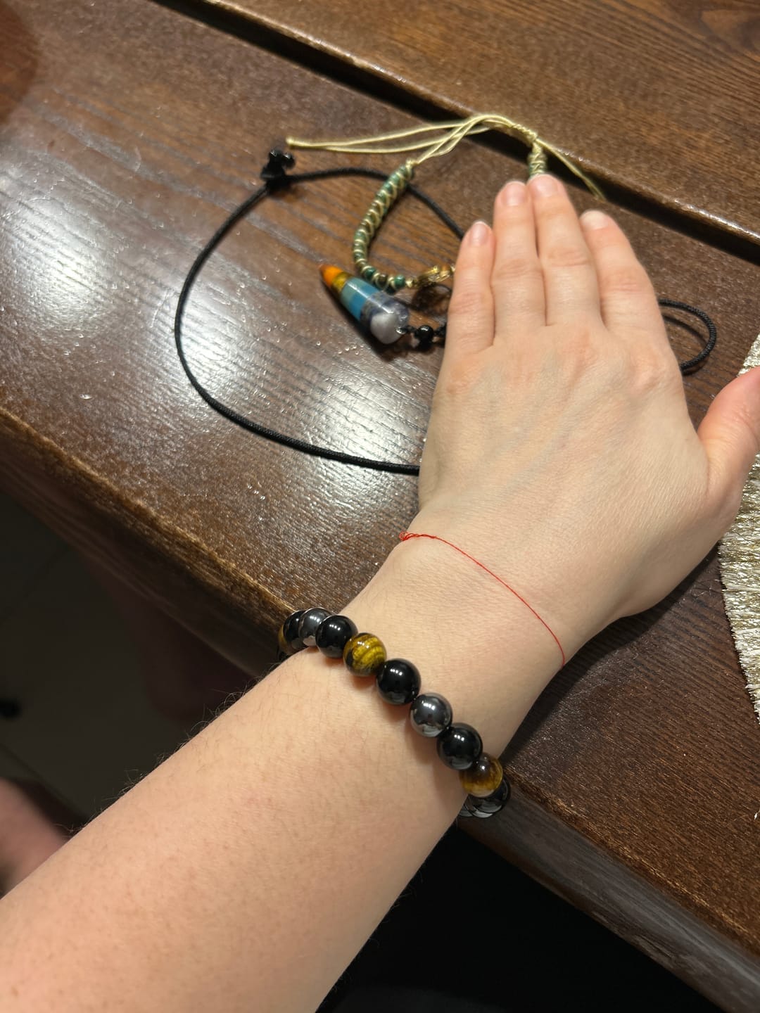 Customer photo review of DREIFACHER SCHÜTZER Tigerauge - Hämatit - Schwarzer Obsidian