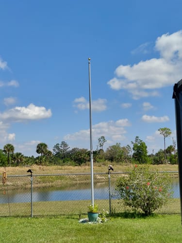 Customer photo review of 15 FT.  Commercial Aluminum Flagpole with External Rope Halyard Rated At 120 mph