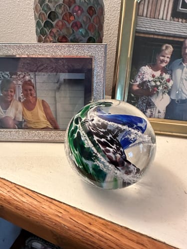 Customer photo review of Blue & Green Cat Eye Orb with Cremation Ashes
