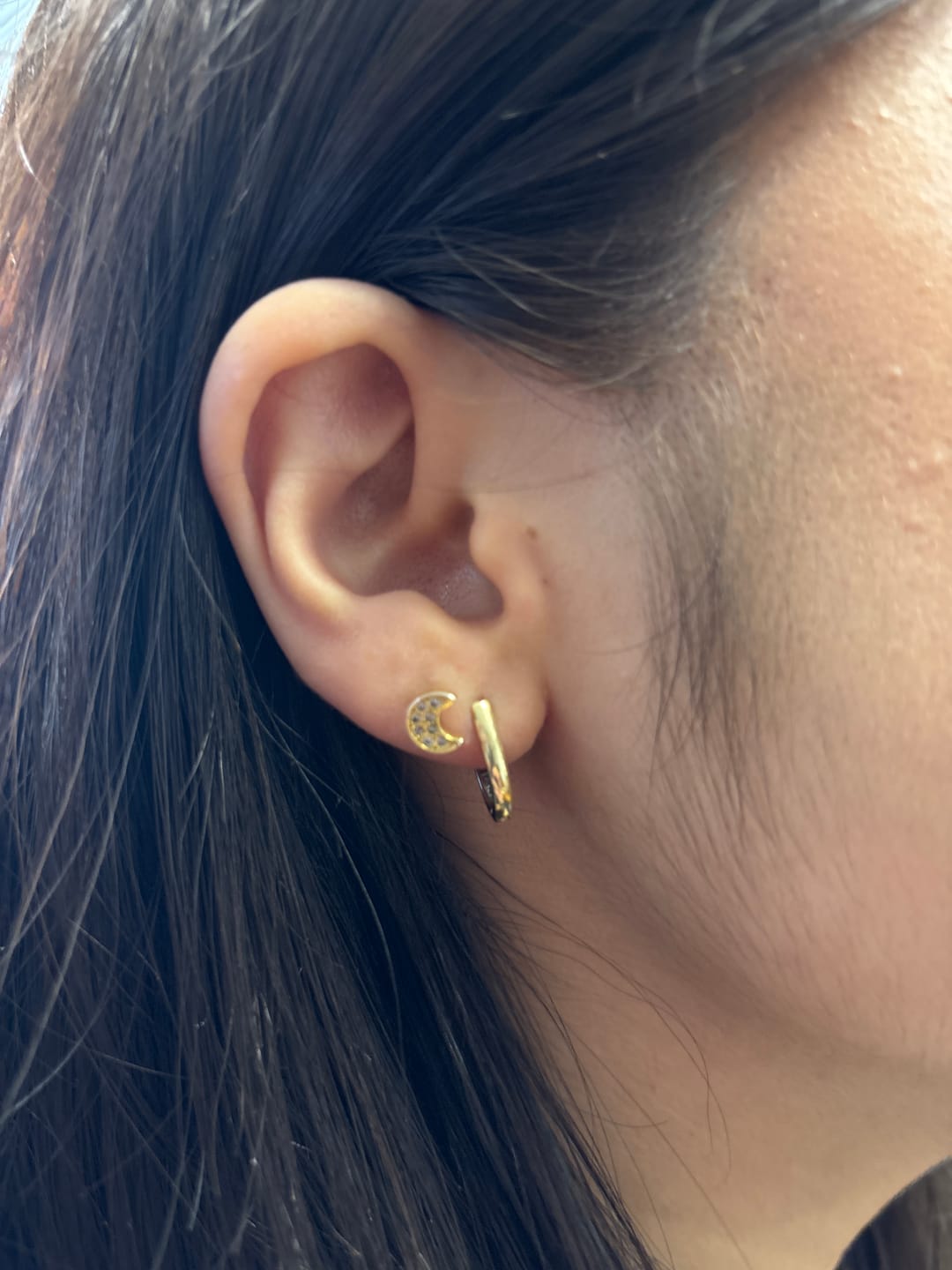 Customer photo review of Acero Quirúrgico Dorado Con Zirconias Primera Perforación