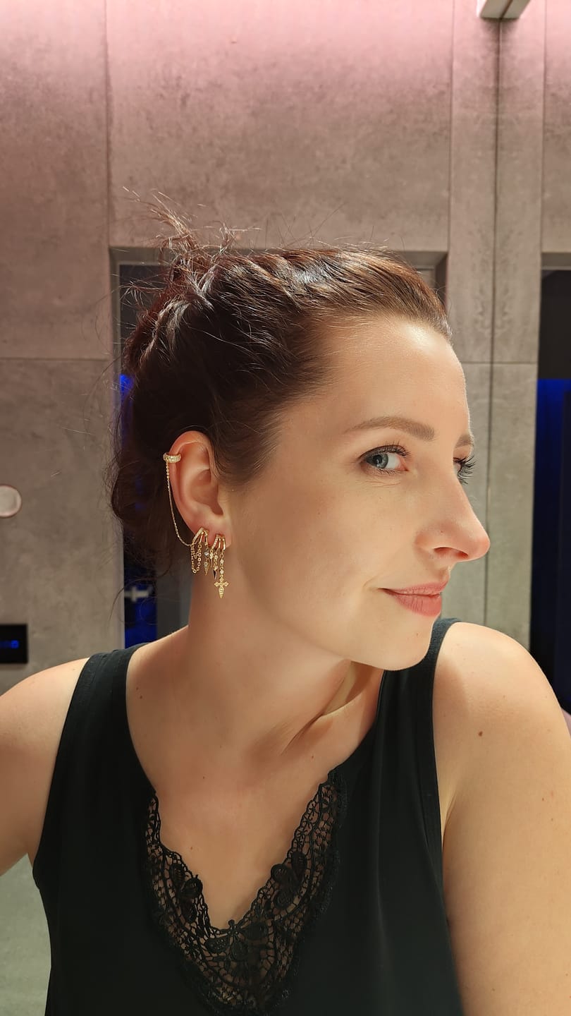 Customer photo review of Naxos Cross Illusion Earrings