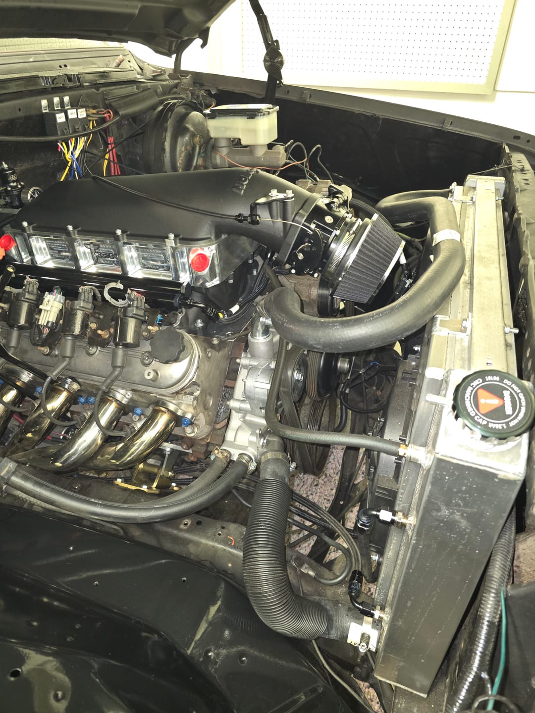 Customer photo review of Holley Hi-Ram / Low Ram Throttle Cable Bracket Black Anodized (Motion/Lokar Throttle Cable) 18-10005