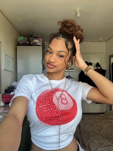 Customer photo review of lucky shot baby tee