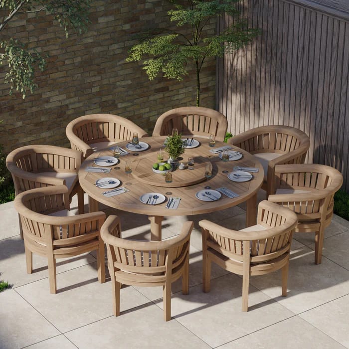 Customer photo review of Teak Oval 180-240cm Extending Table 4cm Top (8 Oxford Stacking Chairs) cushions included.