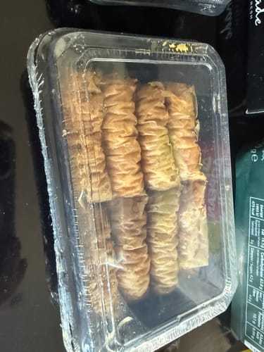 Customer photo review of Traditional Greek Saragli – Rolled Baklava with Almonds (8 pieces – 250g)