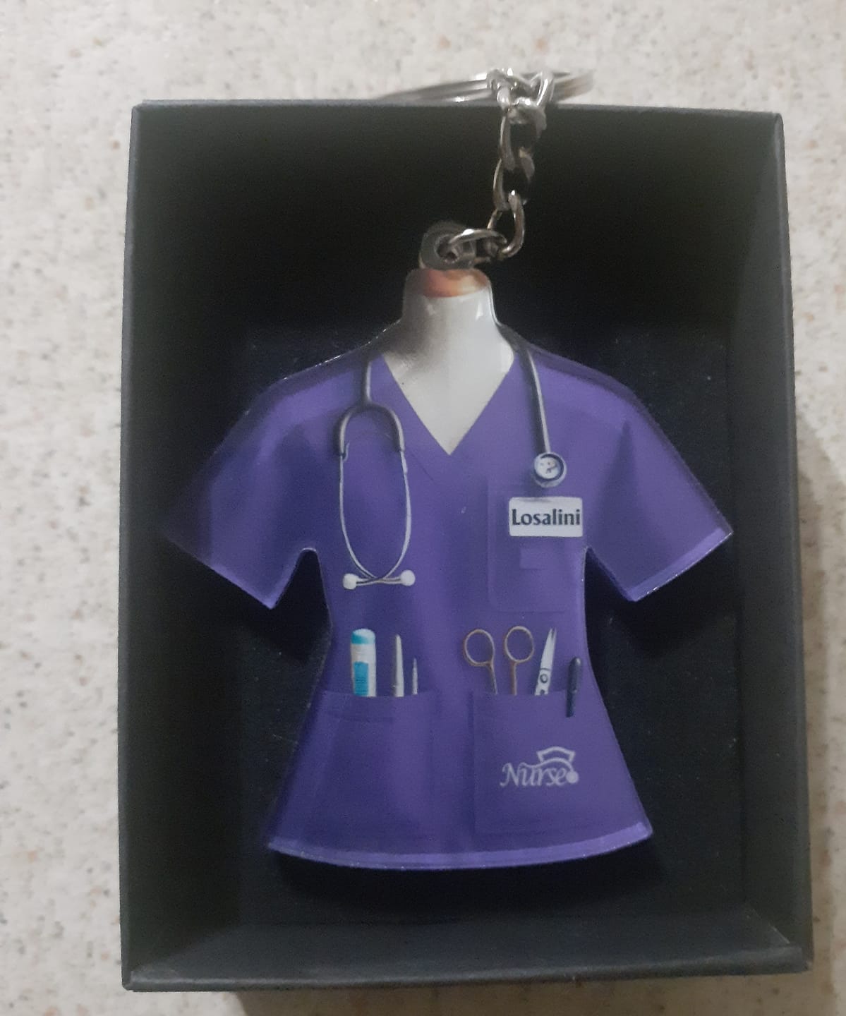 Customer photo review of Nurse Uniform Custom Name Personalized Keychain