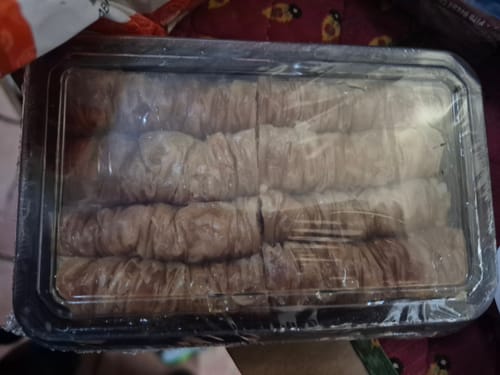 Customer photo review of Traditional Greek Saragli – Rolled Baklava with Almonds (8 pieces – 250g)