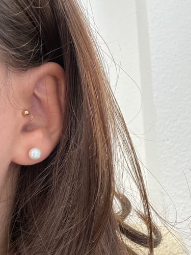Customer photo review of Simple Labret Piercing Gold
