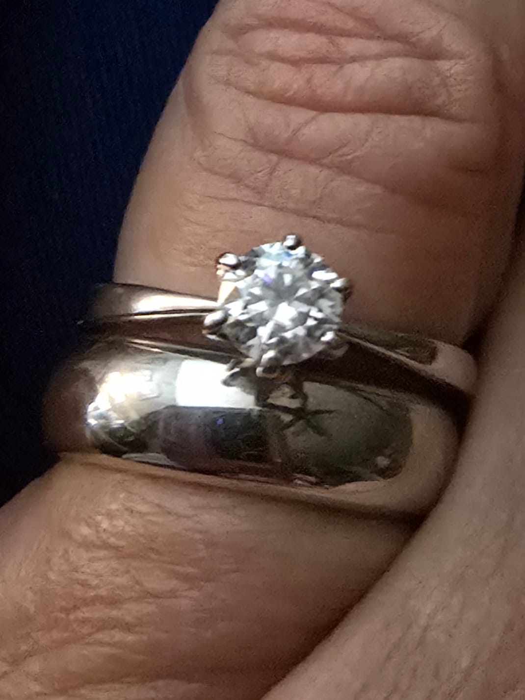 Customer photo review of Classic Solitaire Moissanite Six-Prong Sterling Silver Engagement Ring