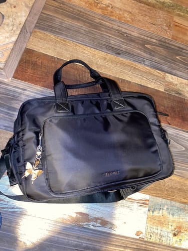 Reseña con foto de un cliente sobre Bolso Maternal