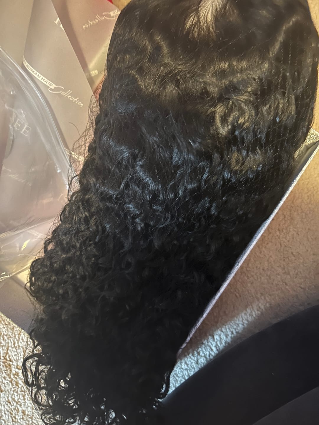 Customer photo review of Wavymy Pre-Bleached HD Lace Wear & Go Pre-Cut Wigs Dome Cap Glueless Water Wave 6x4 Lace Closure Wig 180% Density