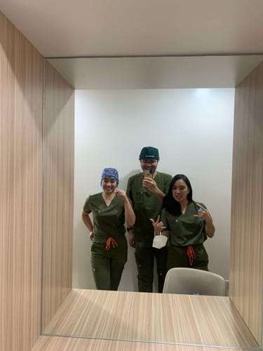 Customer photo review of 4-Pocket MoveTech® Scrub Top - Women / Forest Green