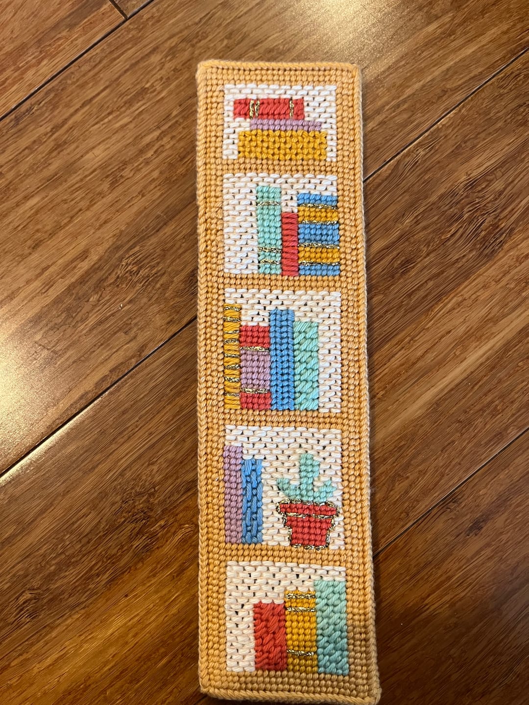 Customer photo review of Bookshelf Wealth Bookmark Needlepoint Kit