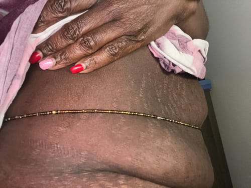 Customer photo review of Melanin And Gold Tie On Waist Beads