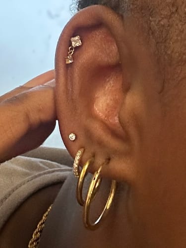 Customer photo review of My Huggies Hoop Earrings
