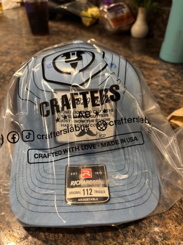 Customer photo review of Custom Leather Patch Trucker Hat - Richardson 112