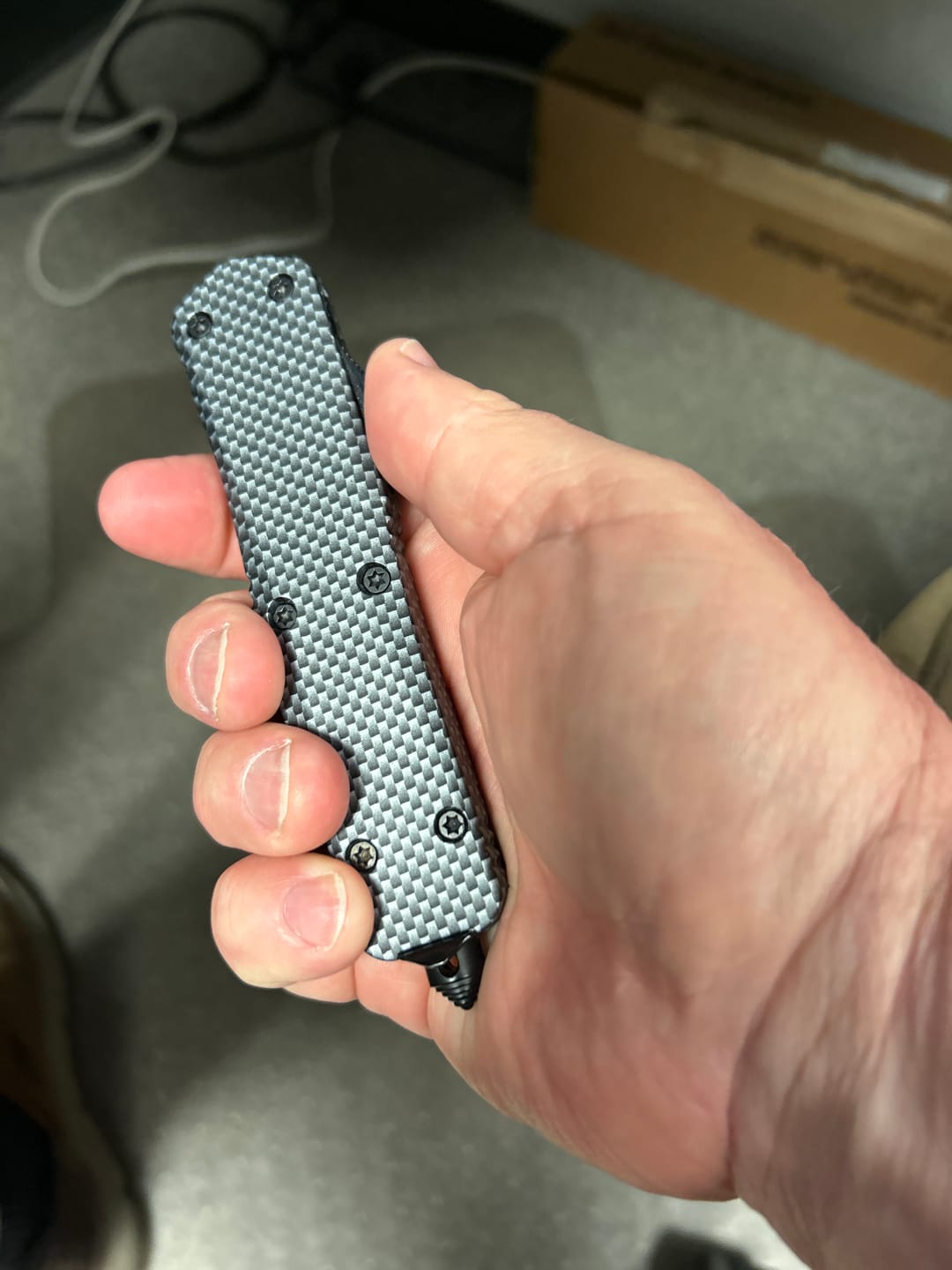Customer photo review of Carbon Fiber Ghost OTF Knife (Multiple Blade Styles Available)