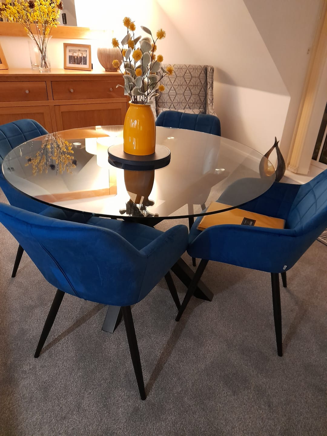 Customer photo review of Heaven Round Dining Table with Clear Glass Top and Black Legs