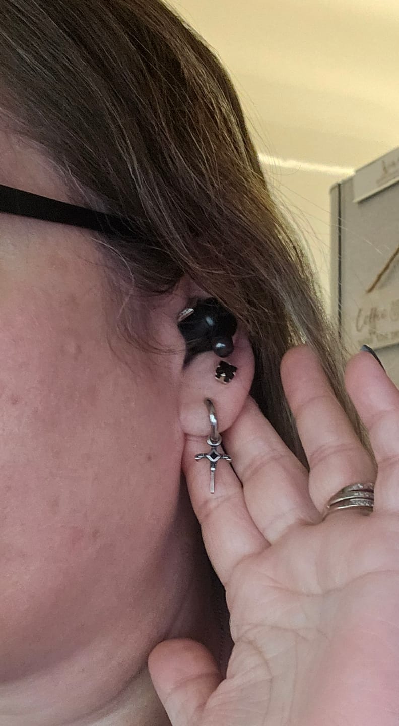 Customer photo review of Dagger Hoop Earrings