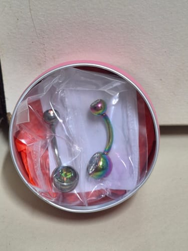 Customer photo review of Titanium Internally Threaded Gem Belly Rings