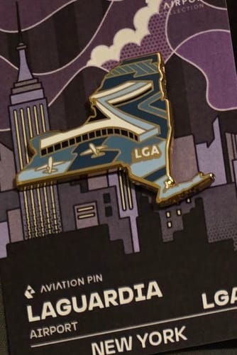 Customer photo review of Airport Enamel Pin | LGA - New York