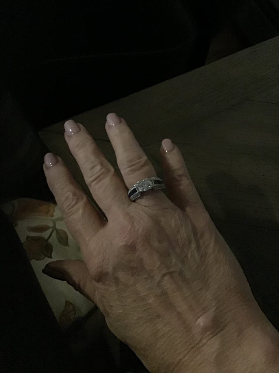Customer photo review of Round Moissanite And Emerald-Cut Sapphire Channel Set Milgrain Engagement Ring