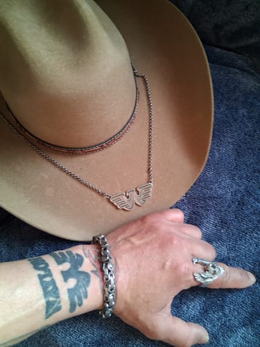 Customer photo review of Waylon Jennings Flying W Necklace