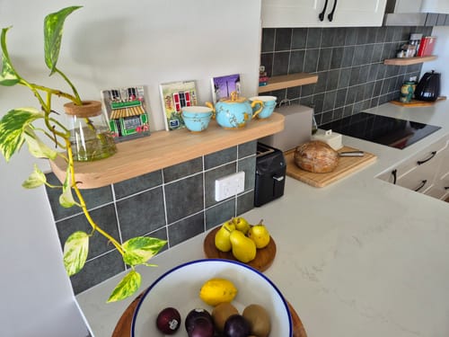 Customer photo review of Curved Floating Shelf