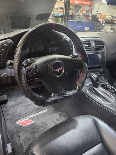 Customer photo review of Genuine Carbon Fiber Steering Wheel With Button Trim For C6 Corvette 2006-2011