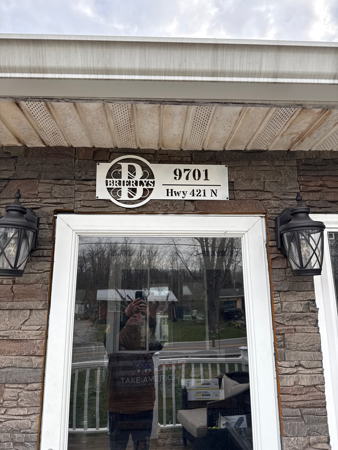 Customer photo review of Family Name Address Metal Sign