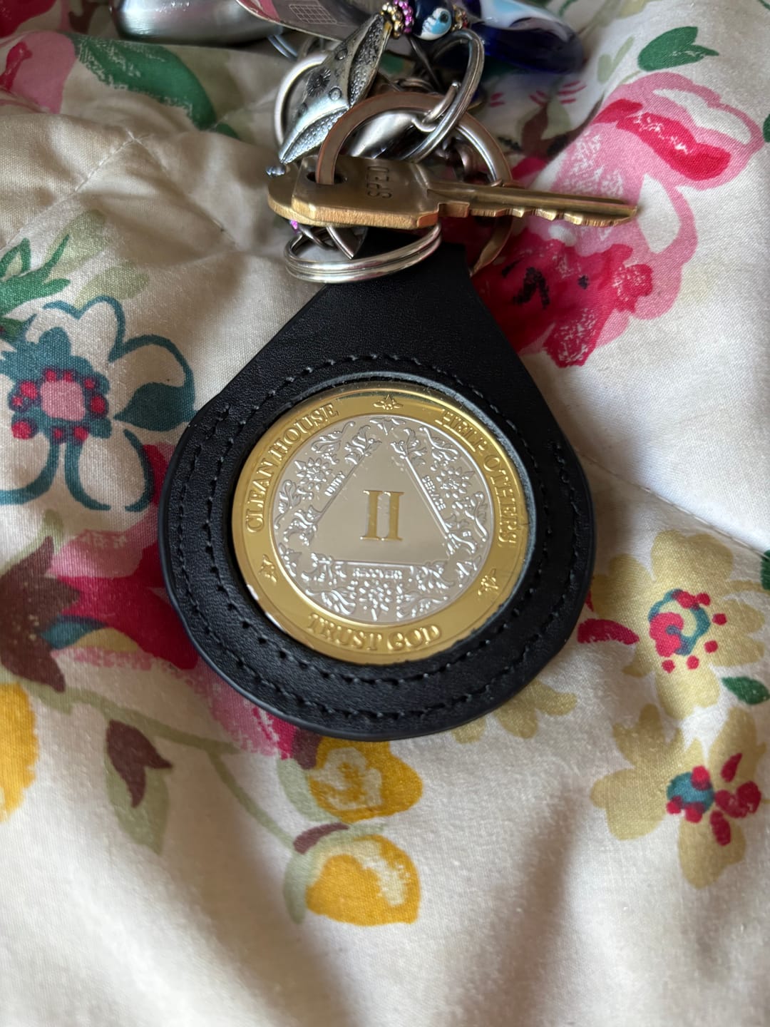 Customer photo review of Sobriety Mint Genuine Leather 40mm AA Medallion Keychain Holder - Recovery Chip/Coin/Token Holder - Black