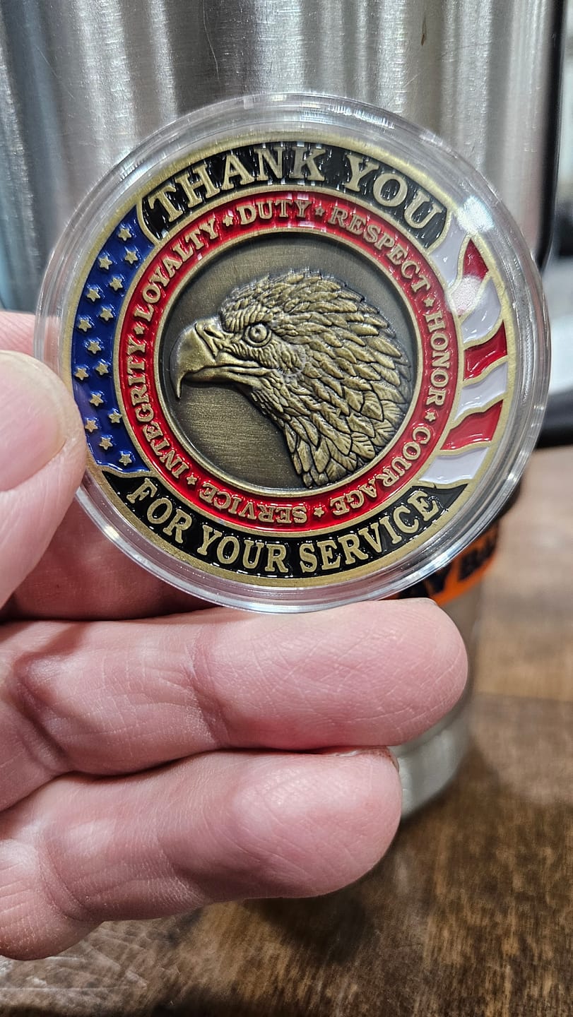 Customer photo review of Honoring All Who Served Thank You Coin