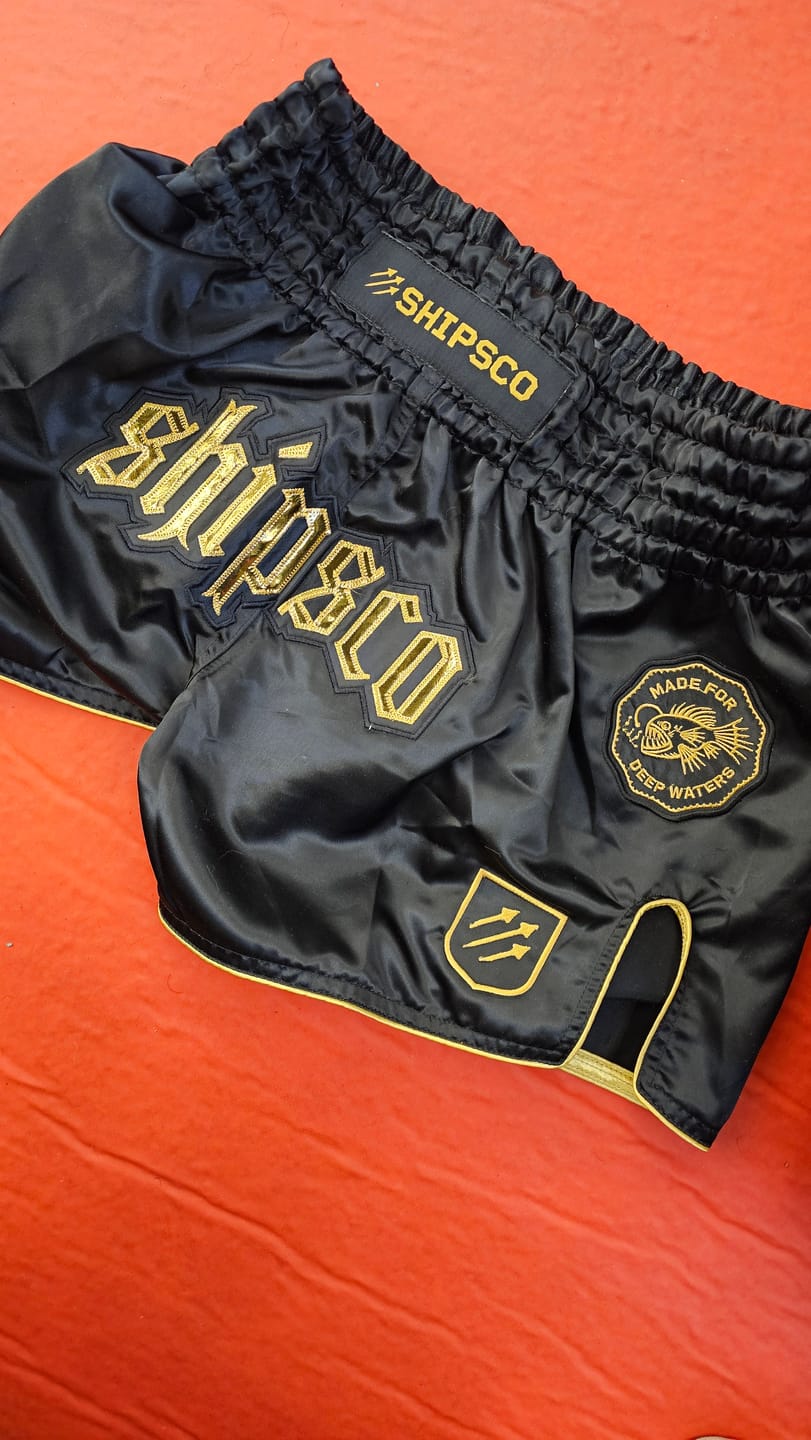 Customer photo review of Deep Waters II Black and Gold Muay Thai Shorts