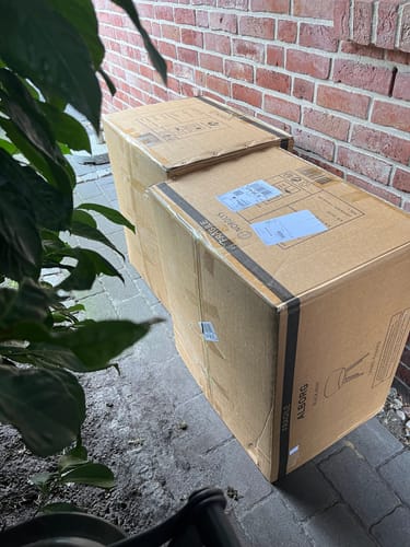 Customer photo review of ALBORG - Lot de 4 chaises scandinaves en bois et polypropylène noir