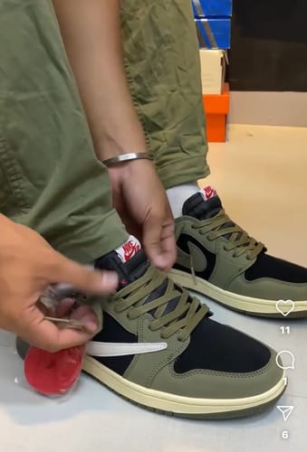 Customer photo review of Travis Scott AJ1 Retro Low OG 'Black Olive'