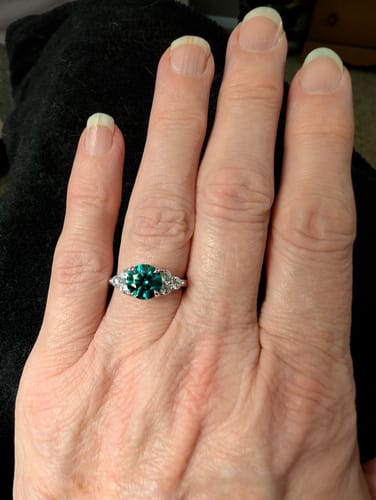 Customer photo review of Green Moissanite Side Stone Engagement Ring