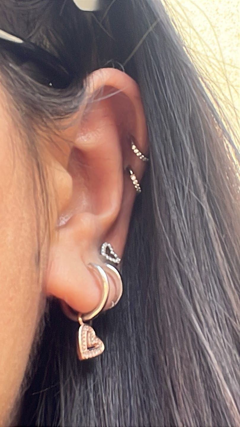 Customer photo review of Piercing Infinity con Zirconias Titanio