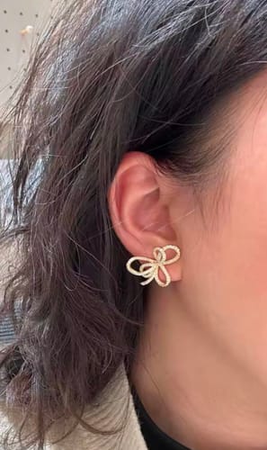 Customer photo review of Graffy Bow Knot Moissanite Stud Earrings 14K White Gold Plated Silver