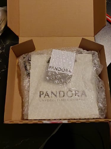 Customer photo review of ANILLO PANDORA CORAZON ELEVADO ROJO + KIT DE REGALO