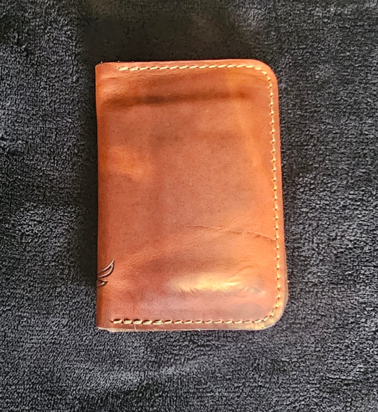 Customer photo review of The Tyler Vertical Wallet