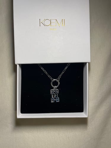 Customer photo review of Hashira Charm Necklace
